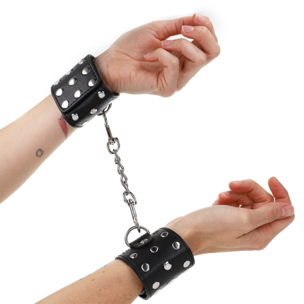 KINK - HANDGELENKFESSELN MIT DRUCKVERSCHLUSS VOLLER NIETEN SCHWARZ VERSTELLBAR 19-24 CM X 5,5 CM - Größe X